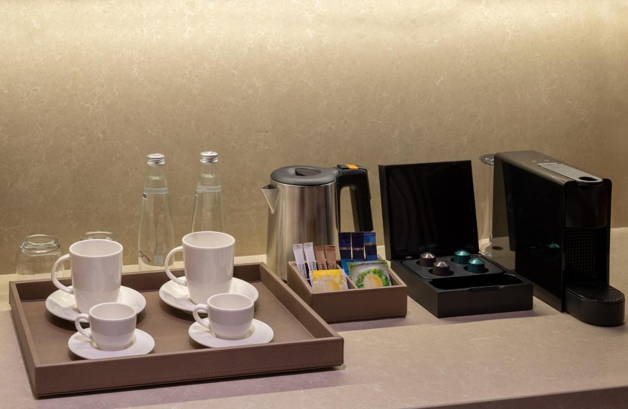 Mövenpick Hotel Istanbul Asia Airport Exteriör bild A Nespresso machine in a hotel room