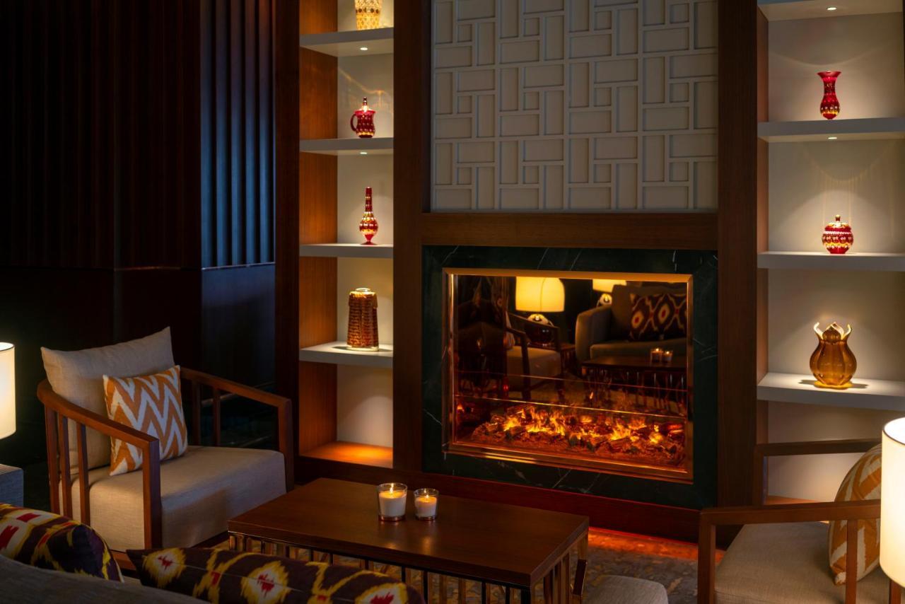 Mövenpick Hotel Istanbul Asia Airport Exteriör bild The fireplace at the lobby